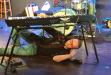 Josh Christina plays Elton John from under the keyboard at Beach Barrels. photo by BB Huey